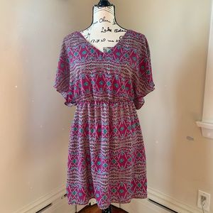 Pink and turquoise dress.